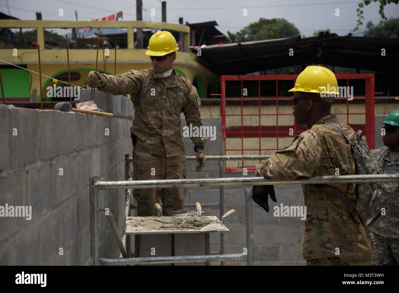 U.S. Army Engineer Sgt. Jacob Flores lays brick at the San Rafael School as part of the Beyond The Horizon Operation in San Rafael, Guatemala, April 25, 2016. Task Force Red Wolf and Army South conducts Humanitarian Civil Assistance Training to include tactical level construction projects and Medical Readiness Training Exercises providing medical access and building schools in Guatemala with the Guatemalan Government and non-government agencies from 05MAR16 to 18JUN16 in order to improve the mission readiness of US forces and to provide a lasting benefit to the people of Guatemala. (U.S. Army  Stock Photo