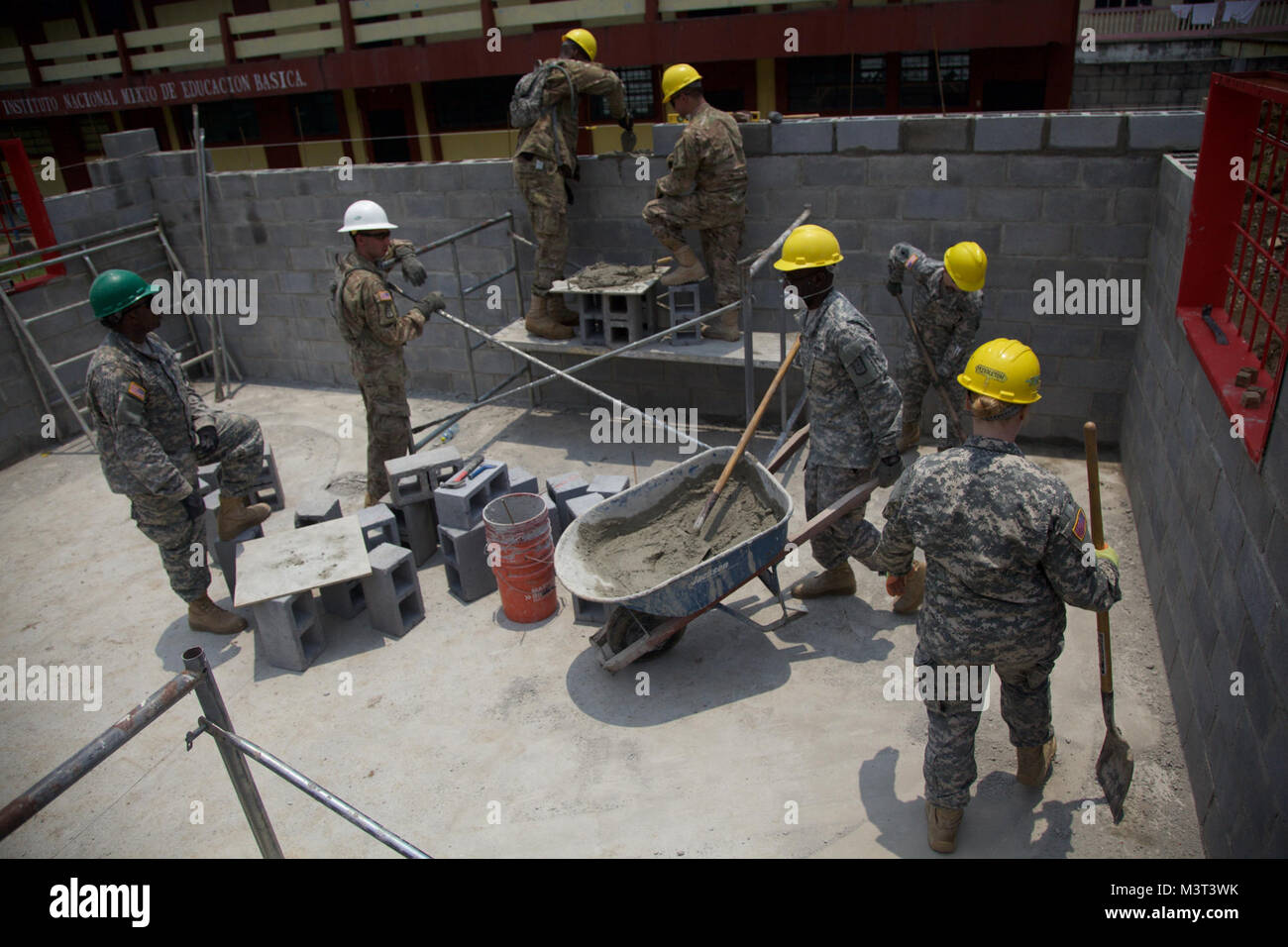 U.S. Army Engineers build upon the San Rafael School as part of the Beyond The Horizon Operation in San Rafael, Guatemala, April 25, 2016. Task Force Red Wolf and Army South conducts Humanitarian Civil Assistance Training to include tactical level construction projects and Medical Readiness Training Exercises providing medical access and building schools in Guatemala with the Guatemalan Government and non-government agencies from 05MAR16 to 18JUN16 in order to improve the mission readiness of US forces and to provide a lasting benefit to the people of Guatemala. (U.S. Army photo by Spc. Gabrie Stock Photo