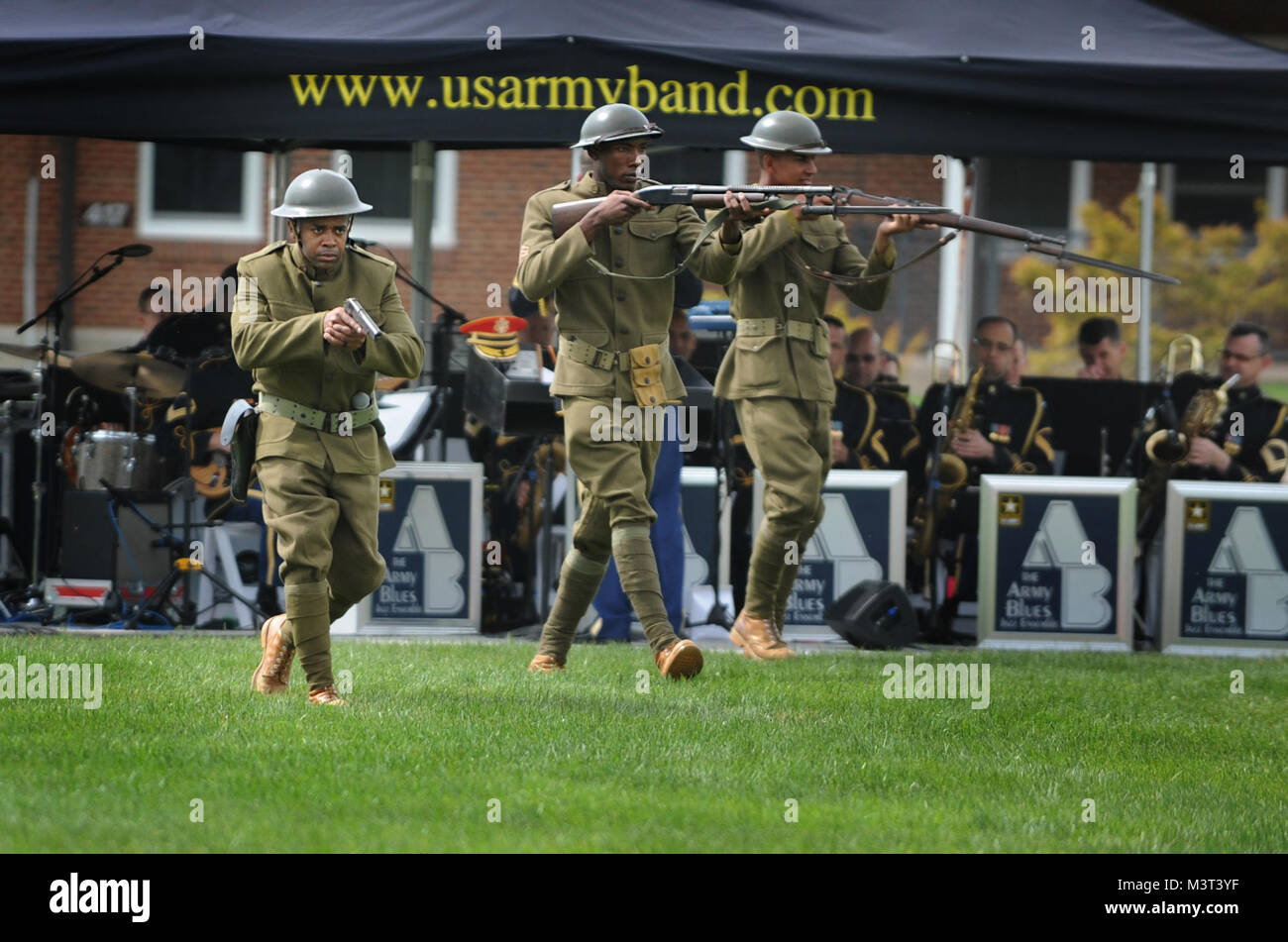 Soldiers from the 3rd U.S. Infantry Regiment (The Old Guard) and The U.S. Army Band (Pershing’s Own) perform World War I “Harlem Hellfighter” demo during Twilight Tattoo 2016 Media Preview Day at Summerall Field, Joint Base Myer-Henderson Hall, Virginia.  Twilight Tattoo, presented on behalf of the U.S. Army, is a fast paced journey that captures 241 years of Soldiers’ stories spanning across generations of men and women who have answered the call to uphold America’s freedom and democracy. The program showcases The Old Guard’s Continental Color Guard, The Commander-in-Chief’s Guard, The U.S. A Stock Photo