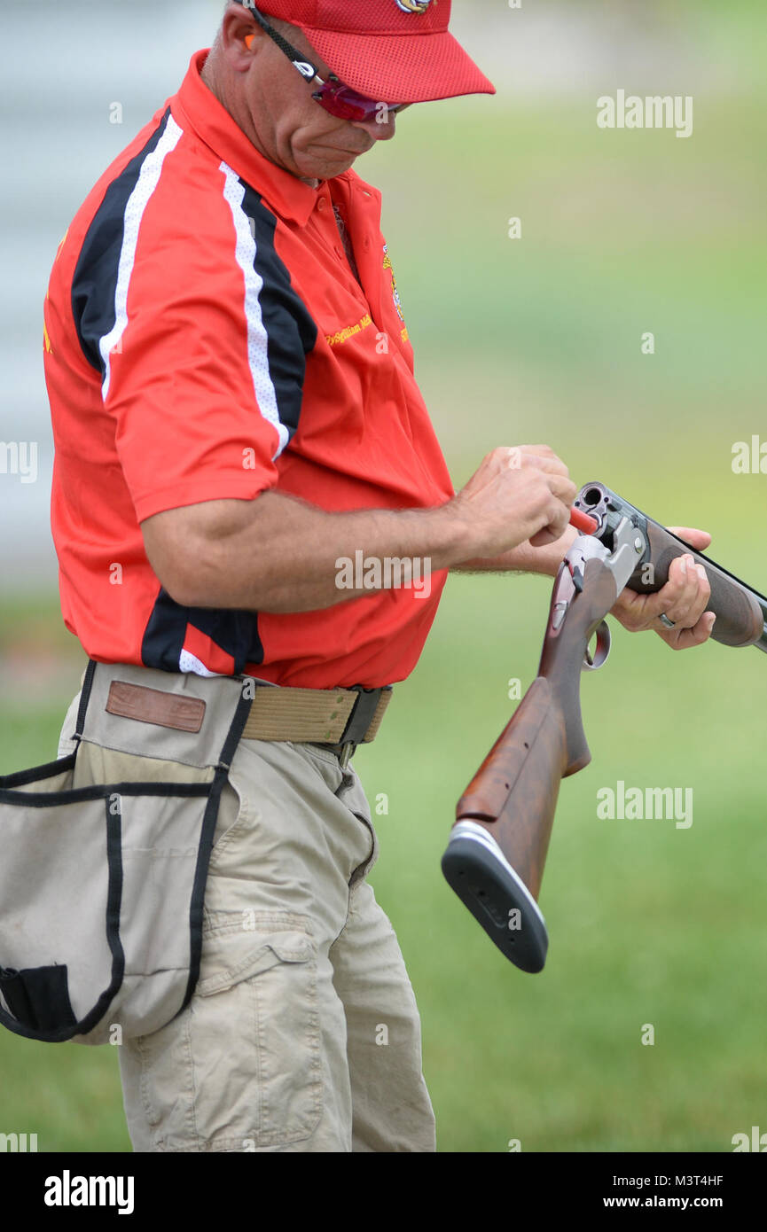 Usmc Skeet Team Member Master Gysgt William Mckenon Loads His Shotgun Prior To Shooting Skeet