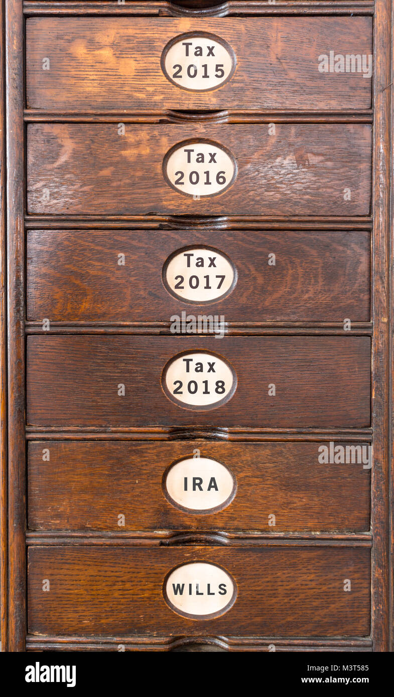 Old wooden filing cabinet with wooden drawers Stock Photo