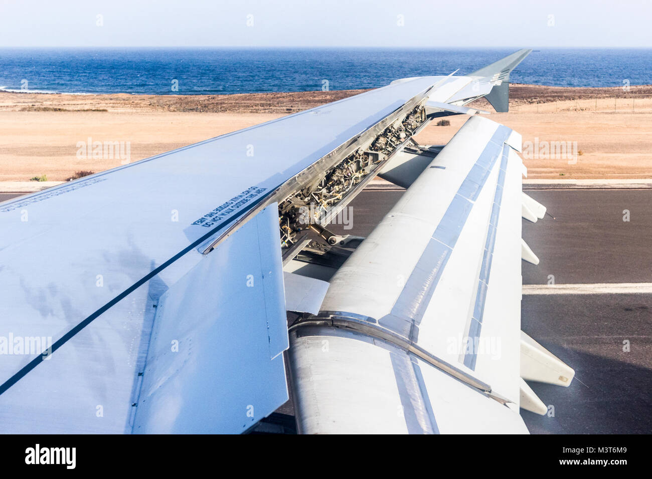 Flaps and air brakes fully employed on an Airbus 321 landing at Fuerteventura Airport, Canary Islands Stock Photo