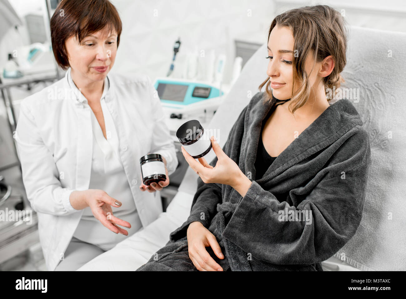 Doctor offering bio additives to a patient Stock Photo