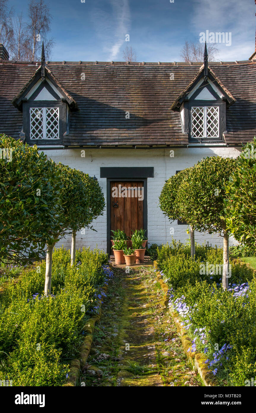 Peckforton Estate Cottage in spring, Peckforton, Cheshire, England, UK Stock Photo