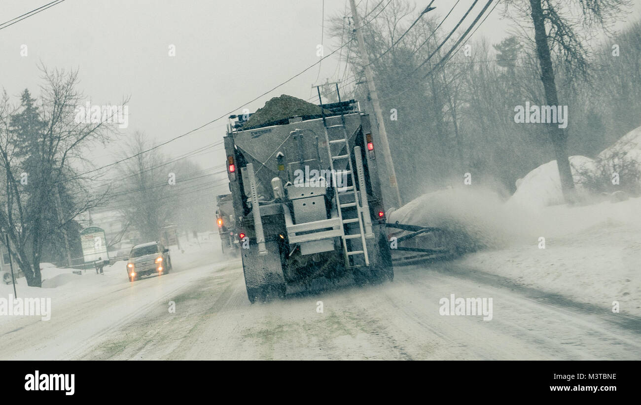 tandem snow plows remove snow/spread salt/sand from Riverside Street