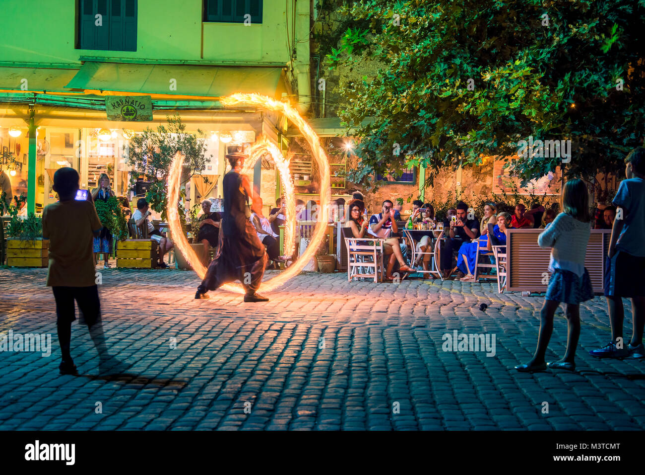 Street entertainer on a fire show in Chania, Crete, Greece Stock Photo