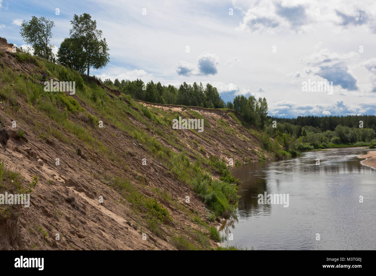 Steep bank of the river Vaga near the village Undercity, Velsky district, Arkhangelsk region, Russia Stock Photo