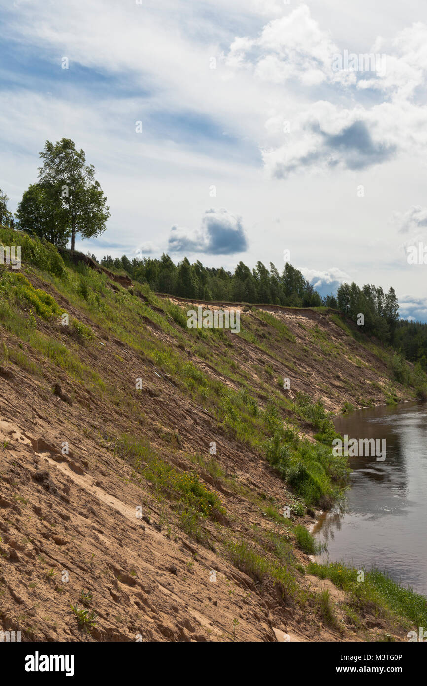 Steep bank of the river Vaga near the village Undercity, Velsky district, Arkhangelsk region, Russia Stock Photo