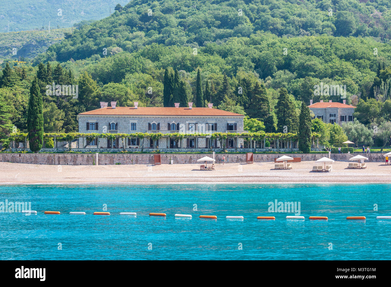Queen’s Beach in front of Villa Milocer Aman Sveti Stefan luxury hotel in Przno, Montenegro Stock Photo