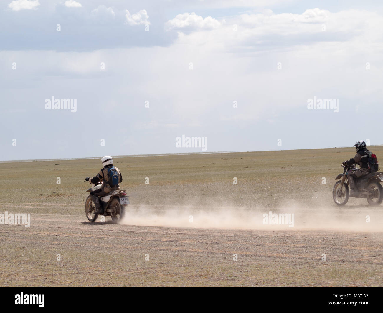 Motorcycling Gobi desert Stock Photo