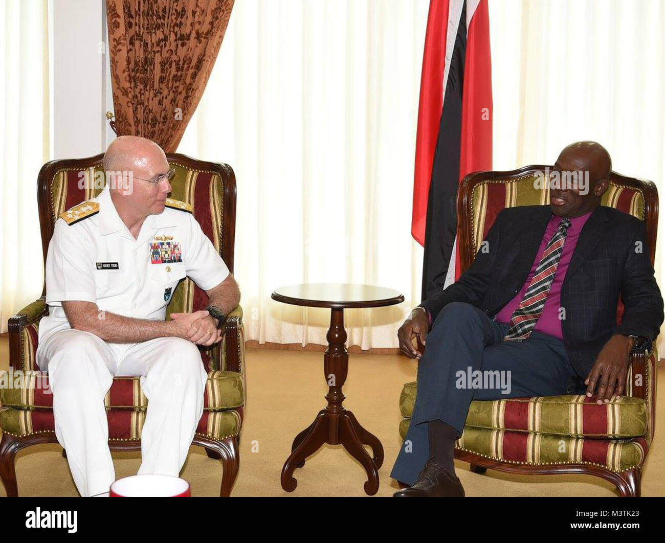 TRINIDAD & TOBAGO (June 15, 2016) -- Navy Adm. Kurt W. Tidd, commander of U.S. Southern Command, meets with Prime Minister Dr. Keith Rowley to discuss security cooperation in taking on transnational threat networks. (Courtesy photo, Office of the Prime Minister of Trinidad and Tobago) 160615-D-BS728-311 by ussouthcom Stock Photo