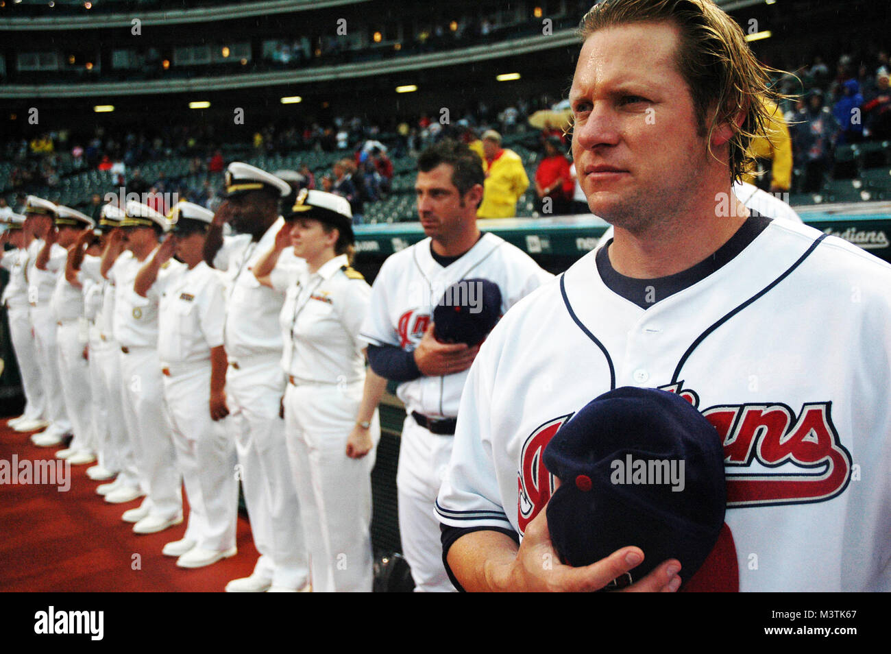 330-CFD-DN-SD-07-13540:  U.S. Navy Sailors join Cleveland Indians Jason Michaels, far right, during the playing of the national anthem at the start of a Major League Baseball game between the Cleveland Indians and Toronto Blue Jays at Jacobs Field, Cleveland, Ohio, on Aug. 28, 2006. The Sailors are participating in Cleveland Navy Week 2006, which runs from Aug. 28 to Sept. 4. Twenty-six such weeks are planned this year in cities throughout the U.S., arranged by the Navy Office of Community Outreach (NAVCO) to enhance Navy awareness in communities with limited Navy exposure.  Photographed by MC Stock Photo