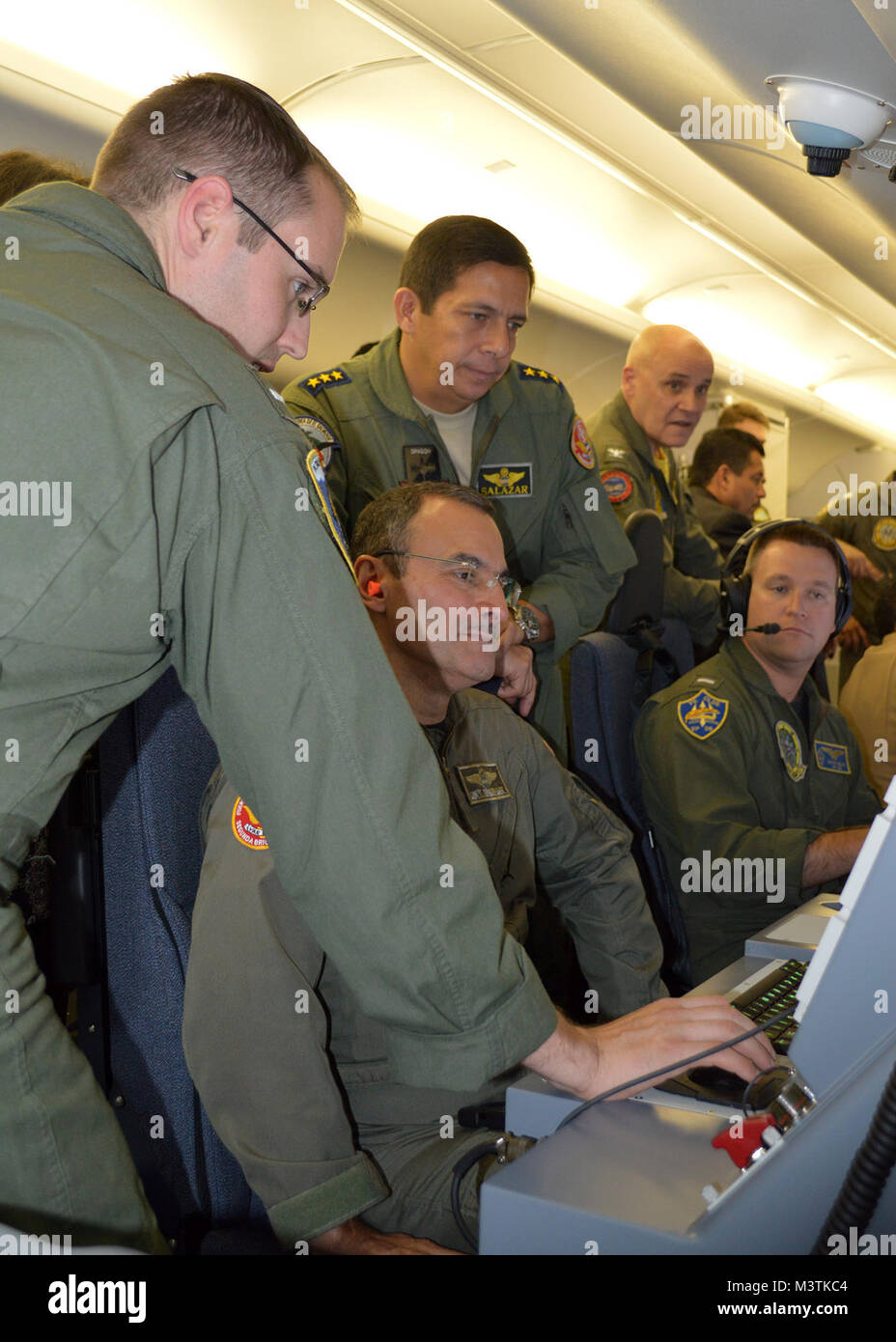 CAMALAPA, El Salvador (Jun. 23, 2016) – Officers assigned to Cooperative Security Location (CSL) El Salvador and officers from El Salvador 2nd Air Brigade receive orientation from the VP-26 aircrew on the P-8A Poseidon maritime surveillance aircraft. The P-8A is expected to deploy to the 4th Fleet area of responsibility in 2017. (U.S. Navy photo by Information Systems Technician 2nd Class Mallory Wasik/Released) 160623-N-PQ607-196 by ussouthcom Stock Photo