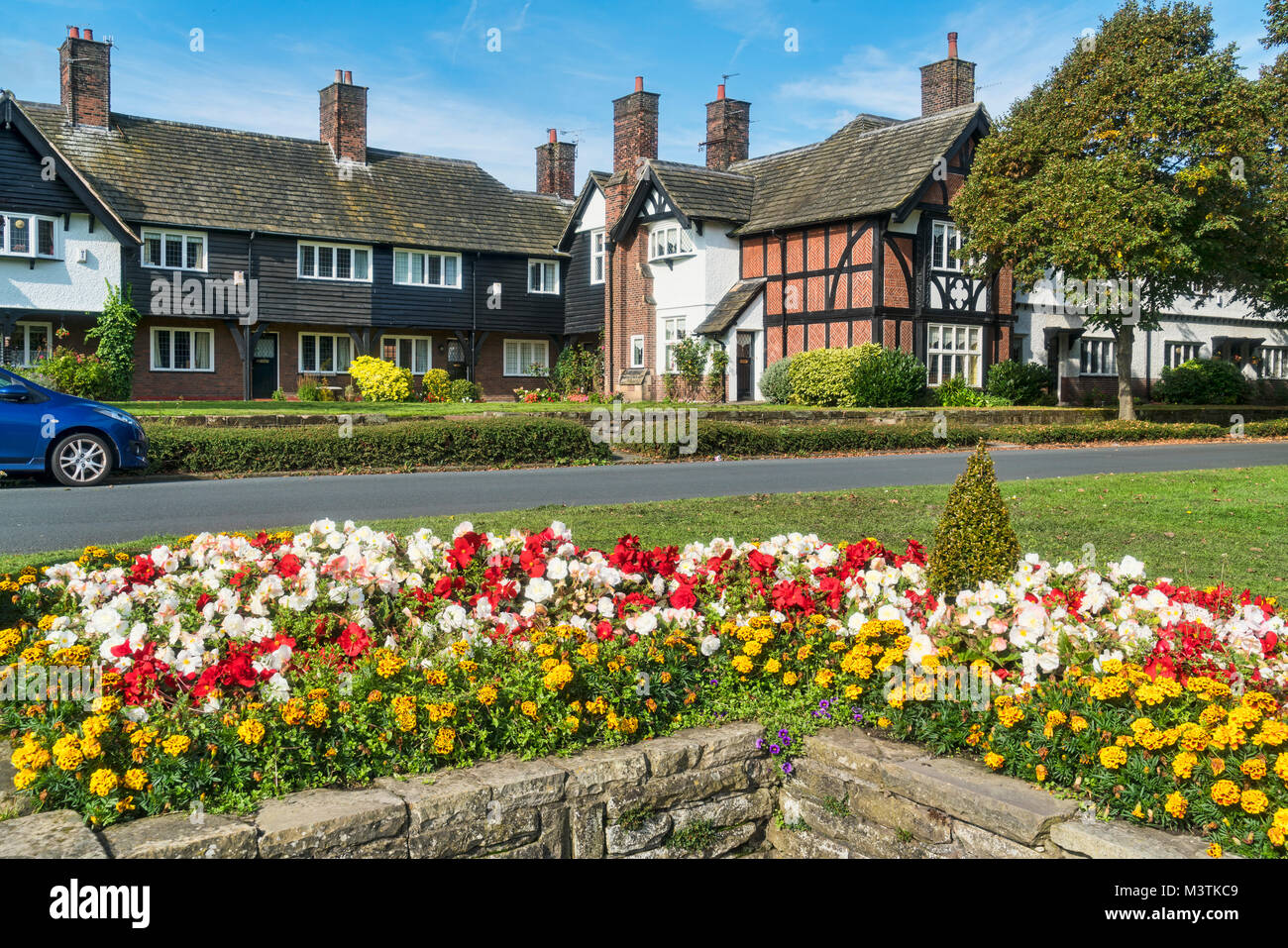 Workers houses, flower display, Port Sunlight, Bebington, Wirral, Merseyside, UK Stock Photo