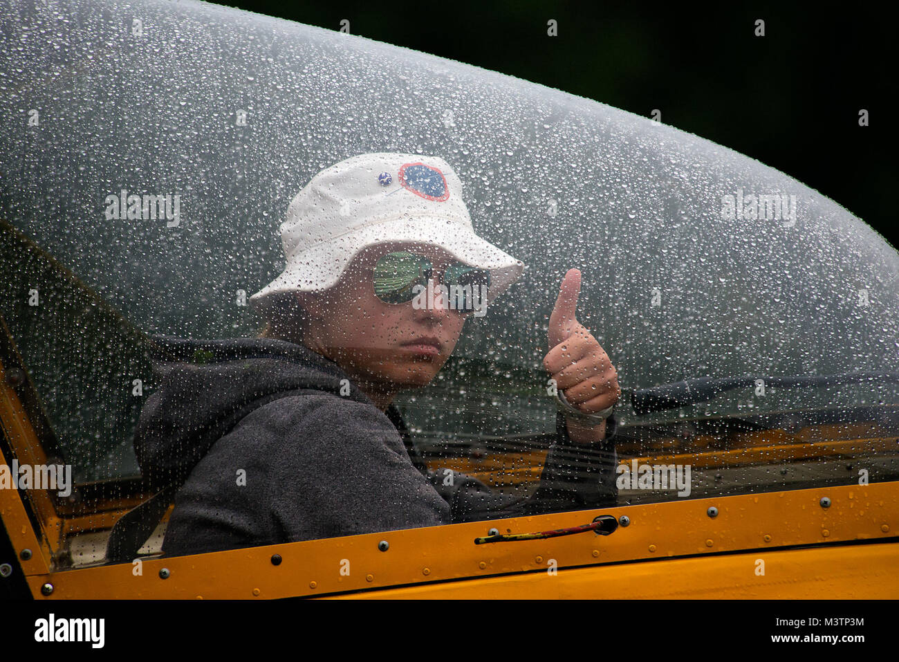 Civil Air Patrol Cadet, Liz Bell, signals to her wing-runner that she is ready for take-off on a solo flight in a Schweizer SGS 2-33A glider in Springfield, Vt. (U.S. Air Force photo/Master Sgt. Jeffrey Allen/Airman magazine) DSC 1966 by AirmanMagazine Stock Photo