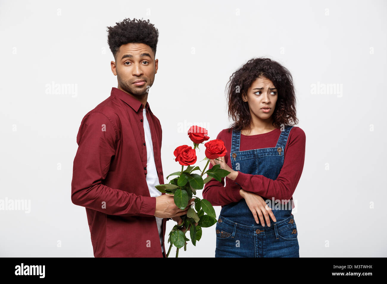 Valentine concept young african american woman upset and ignore rose