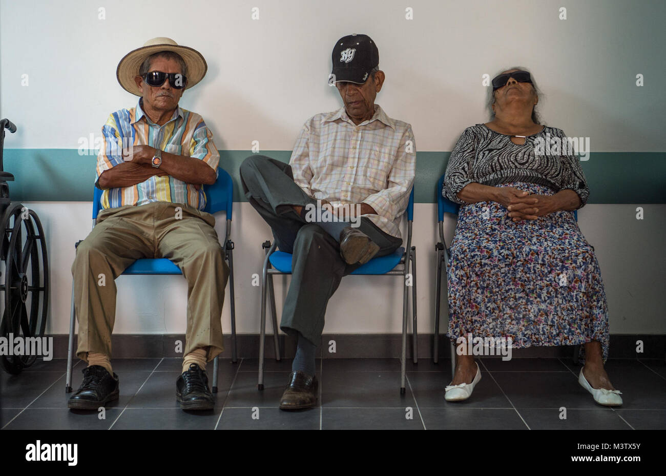 Post-operation patients wait to be seen at the Centro Hospitalario Luis 'Chicho' Fabrega during a medical readiness training exercise in Santiago, Panama, Feb. 7, 2017. A U.S. military medical team was in Panama to help treat individuals with cataracts that otherwise would have gone untreated. Medical readiness training exercises provide U.S. military personnel training in delivery of medical care in austere conditions, promote diplomatic relations between the U.S. and host nations in Central America and provide humanitarian and civic assistance via a long-term proactive program. These exercis Stock Photo