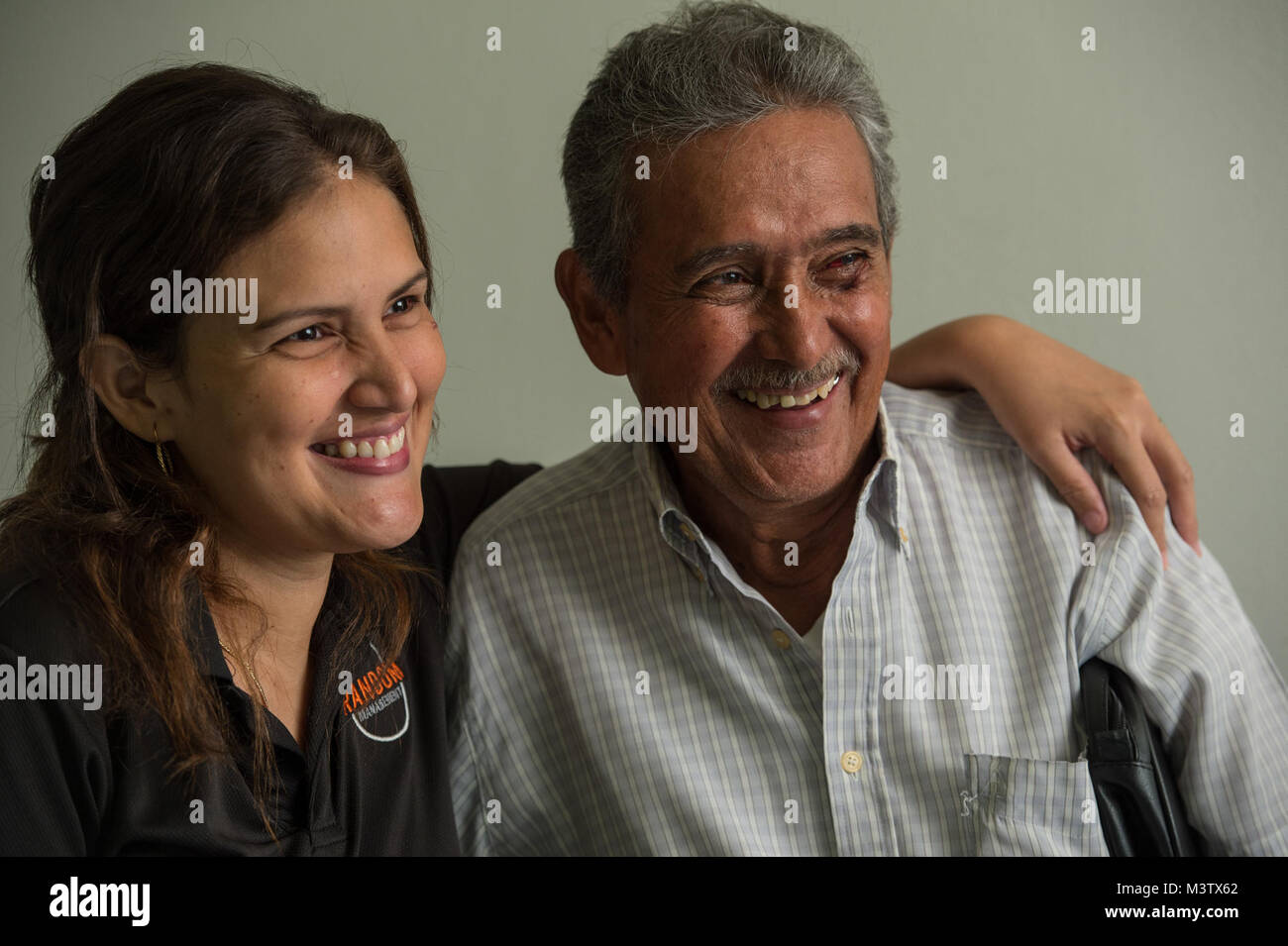 Eduardo Barrera and his daughter Mariyoly smile after Eduardo's post-operation surgery appointment, Feb. 7, 2017. He received an extracapsular cataract extraction with intraocular implant surgery the day before at the Centro Hospitalario Luis 'Chicho' Fabrega during a medical readiness training exercise in Santiago, Panama. A U.S. military medical team was in Panama to help treat individuals with cataracts that otherwise would have gone untreated. Medical readiness training exercises provide U.S. military personnel training in delivery of medical care in austere conditions, promote diplomatic  Stock Photo
