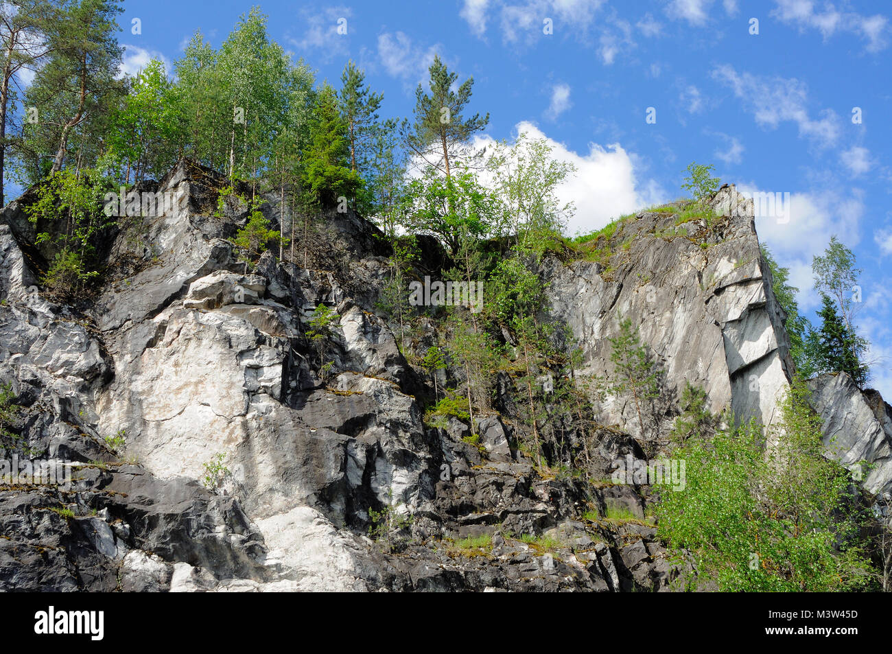 Steep wall in Marble Canyon near Sortavala, Karelia, Russia Stock Photo