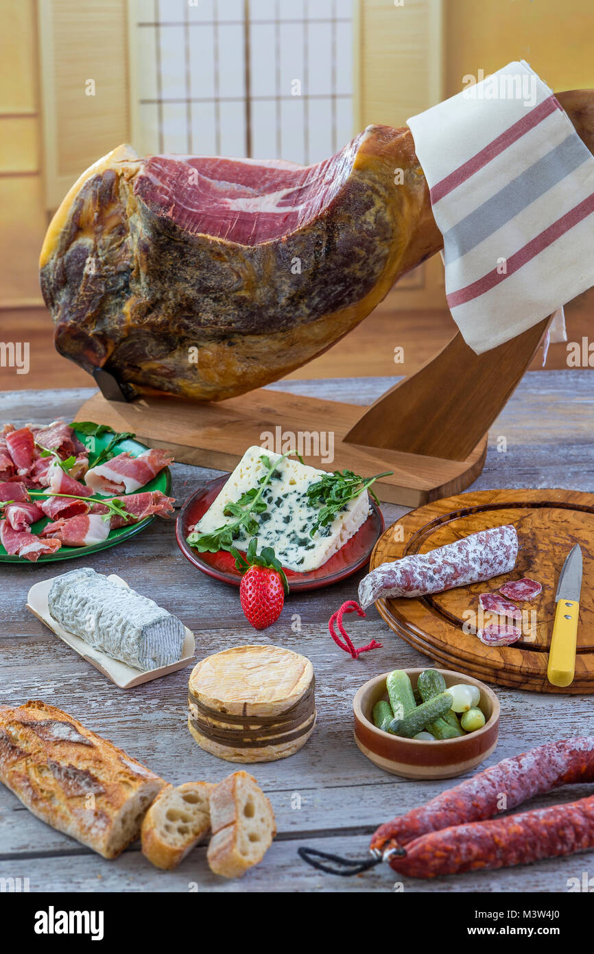 Jamon. Jamon serrano. Traditional Spanish ham close up. Dry cured spanish pork ham in a plate.old vintage wooden background Stock Photo