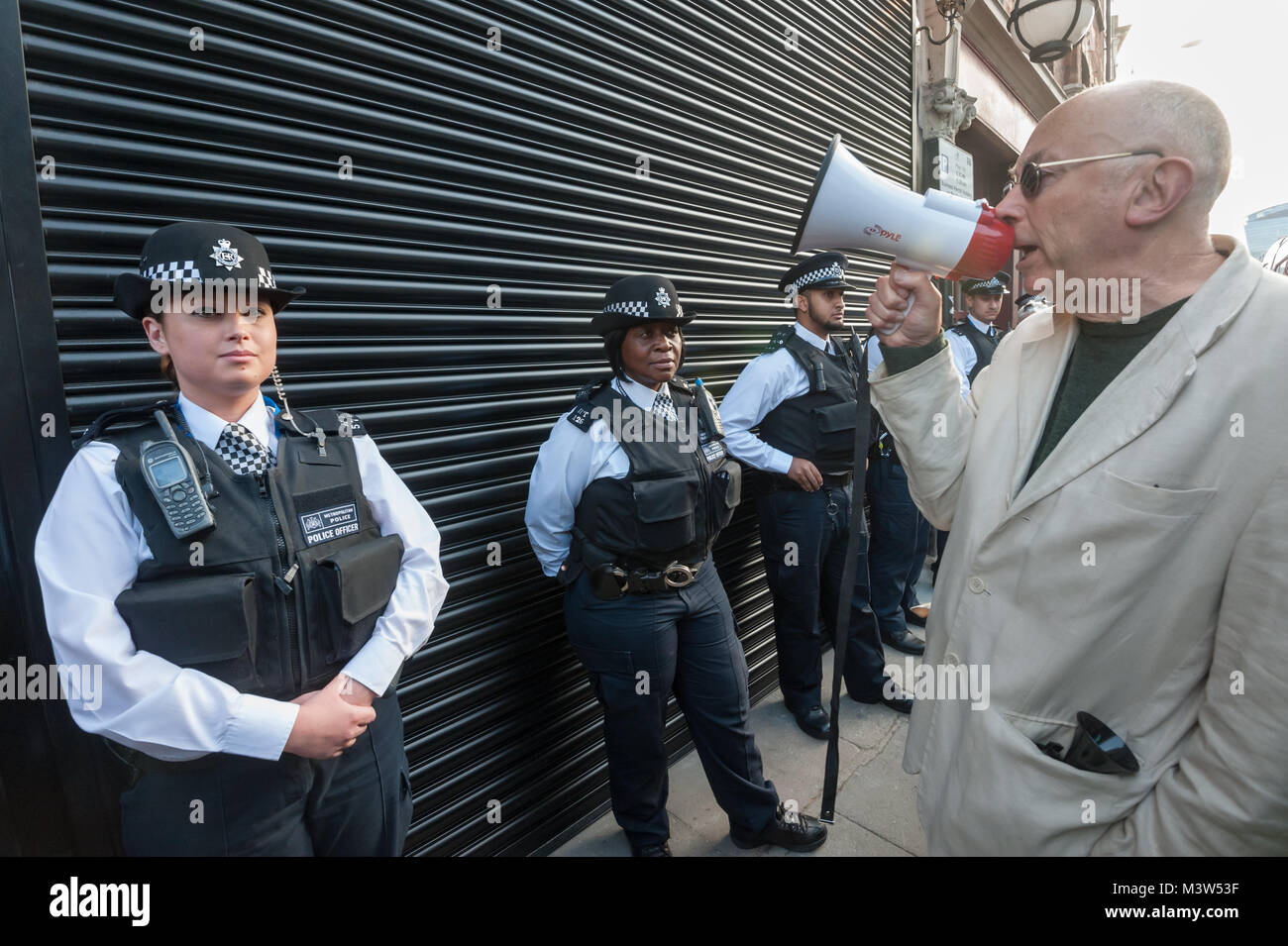 Ian Bone of Class War speaks asking the police if they would defend a museum for murderers of police officers in the same way as they are defending one about a man who committed gruesome murders of women. Stock Photo