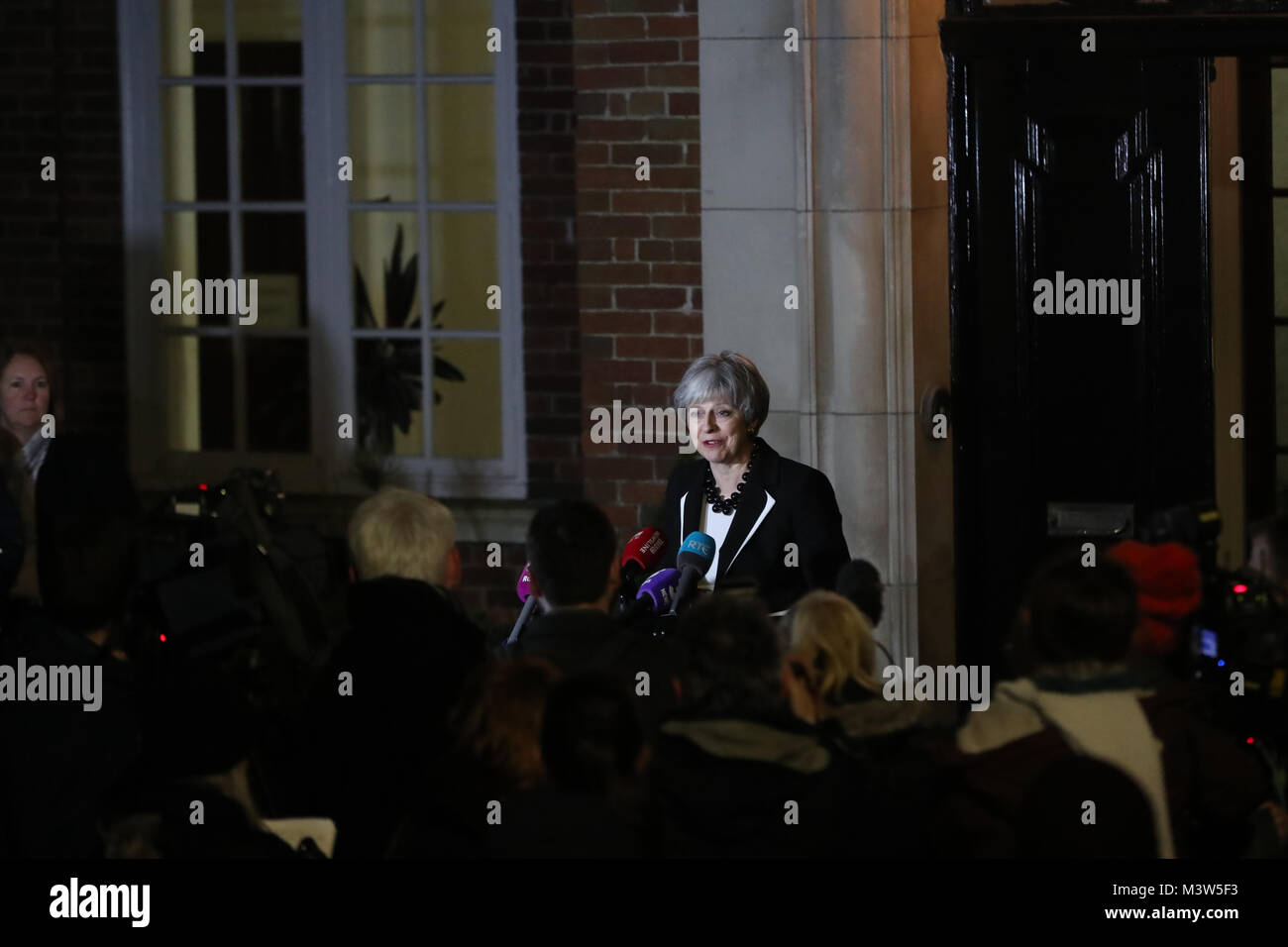 Prime Minister Theresa May speaks outside Stormont House in Belfast, following a bilateral meeting with Taoiseach Leo Varadkar after they held crunch talks at Stormont with the region's political leaders in a bid to encourage Sinn Fein and the Democratic Unionists (DUP) to resolve their differences, amid growing speculation that a deal to restore powersharing is edging closer. Stock Photo