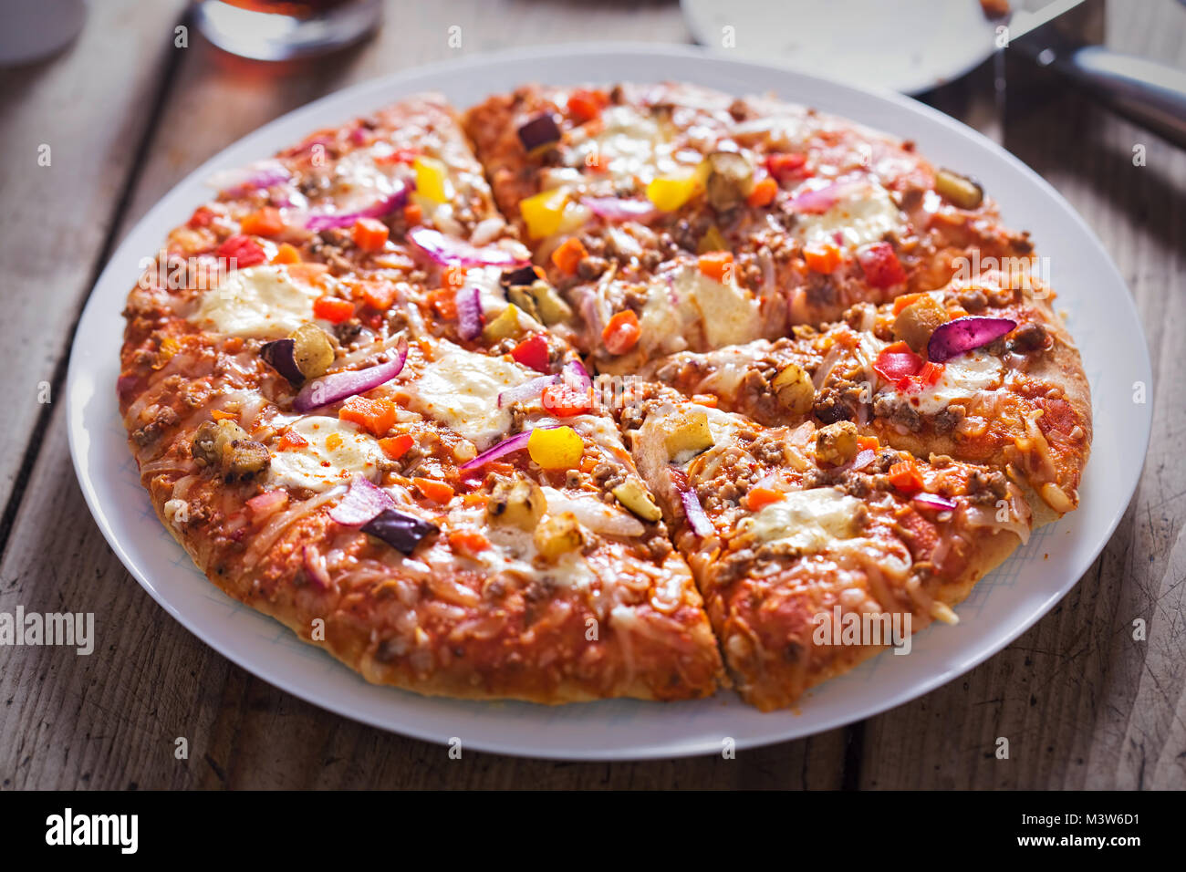 Turkish kebab pizza with beef, pepper, aubergine and red onions Stock