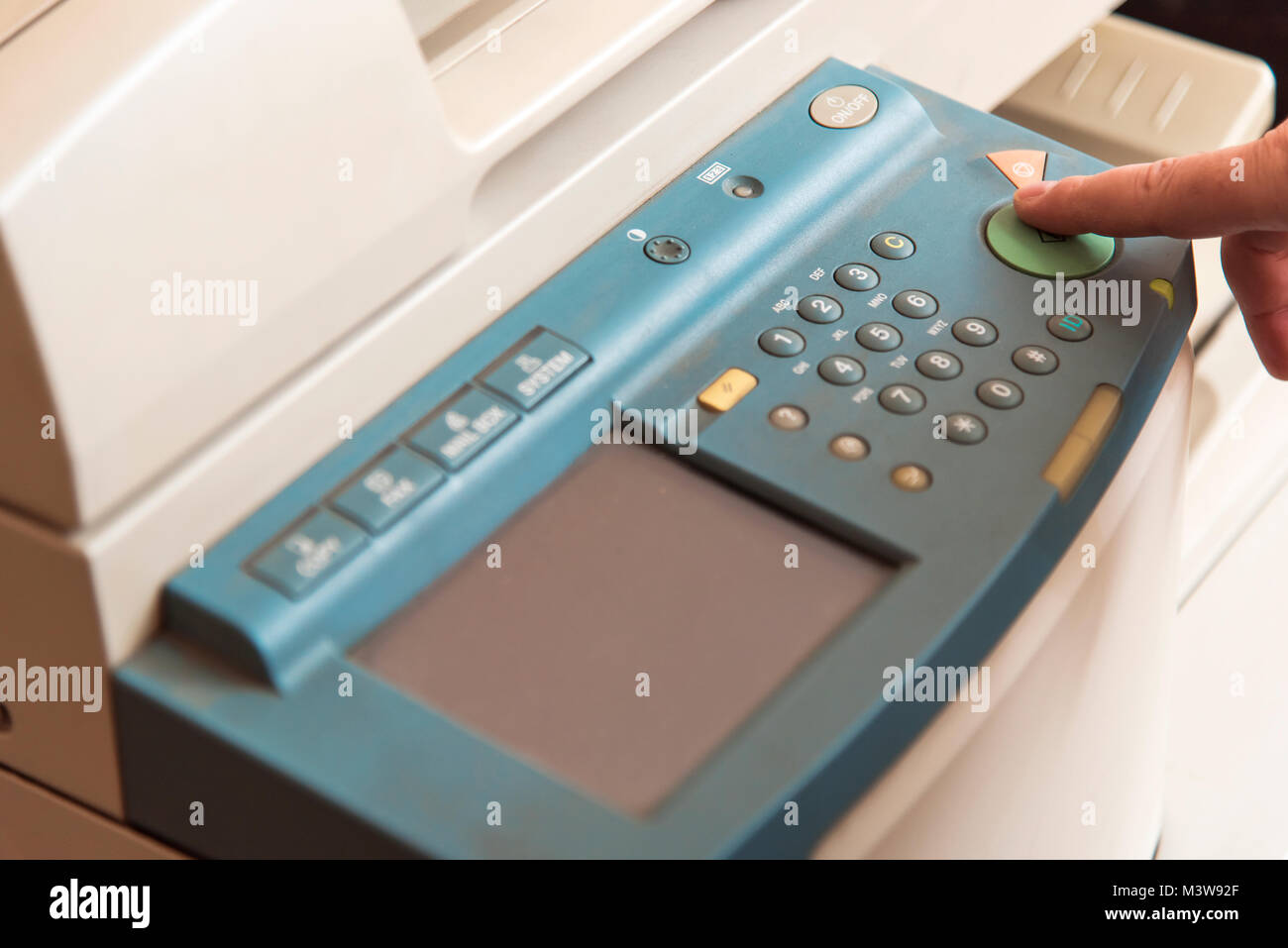 Copying and scanning documents on a machine Stock Photo Alamy