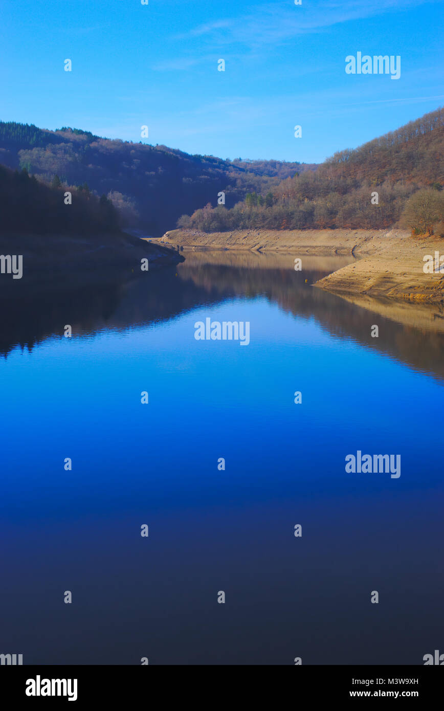reflection of blue sky on the reservoir of fades besserve bridge du bouchet, puy de dome Stock Photo