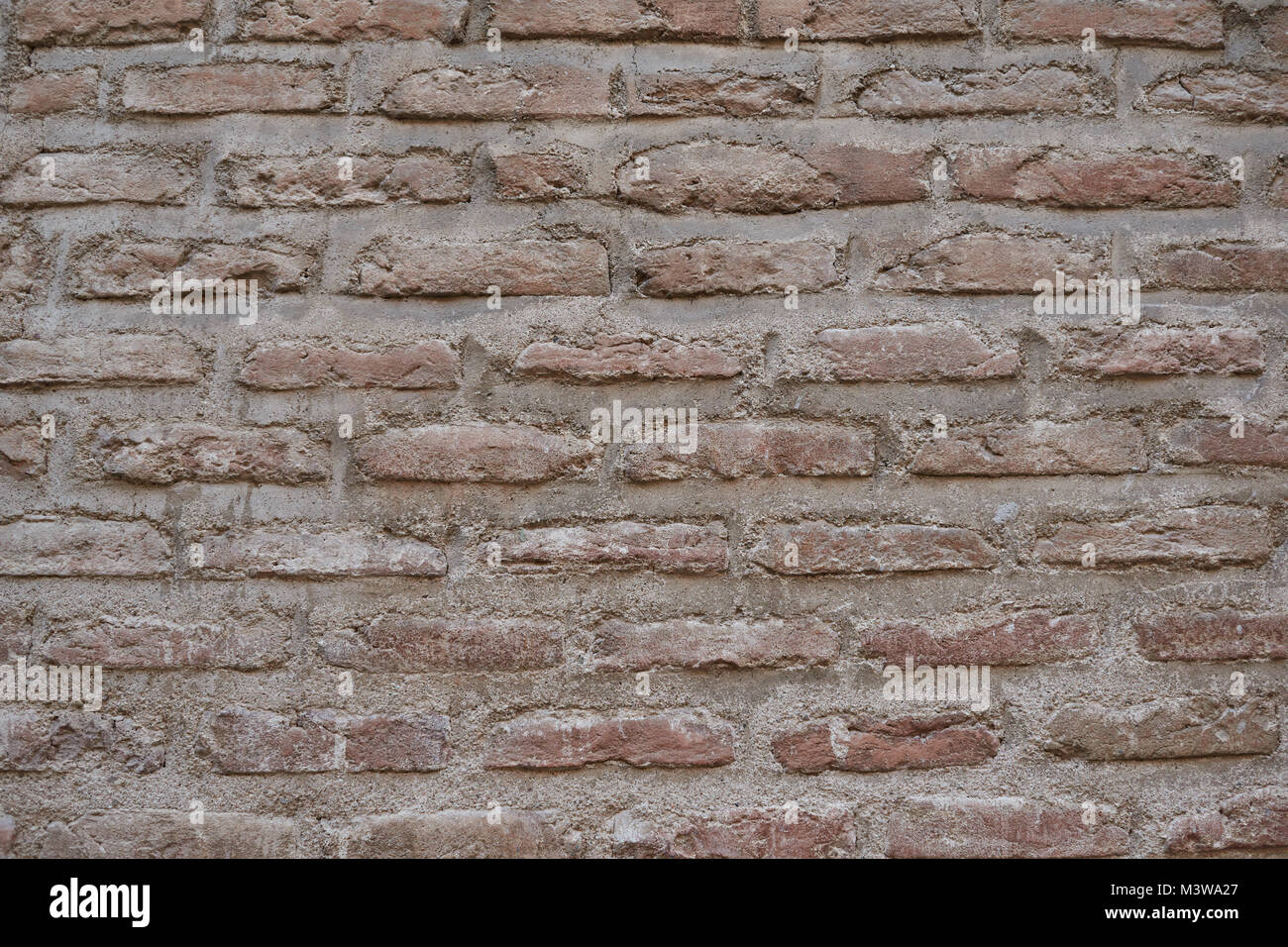 Wall of old brown bricks. Abstract background texture Stock Photo - Alamy