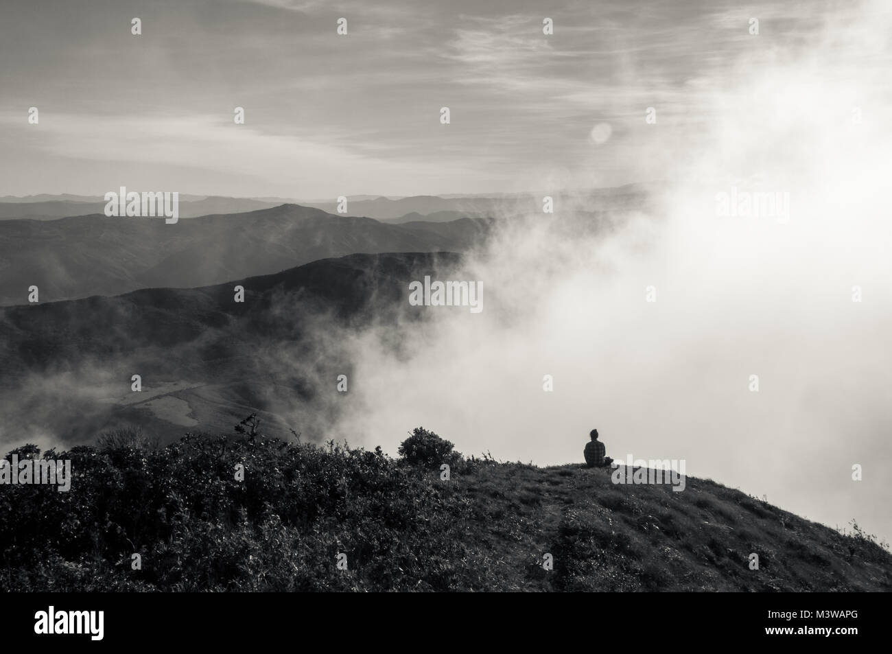 Sitting on top of a mountain hi-res stock photography and images - Alamy