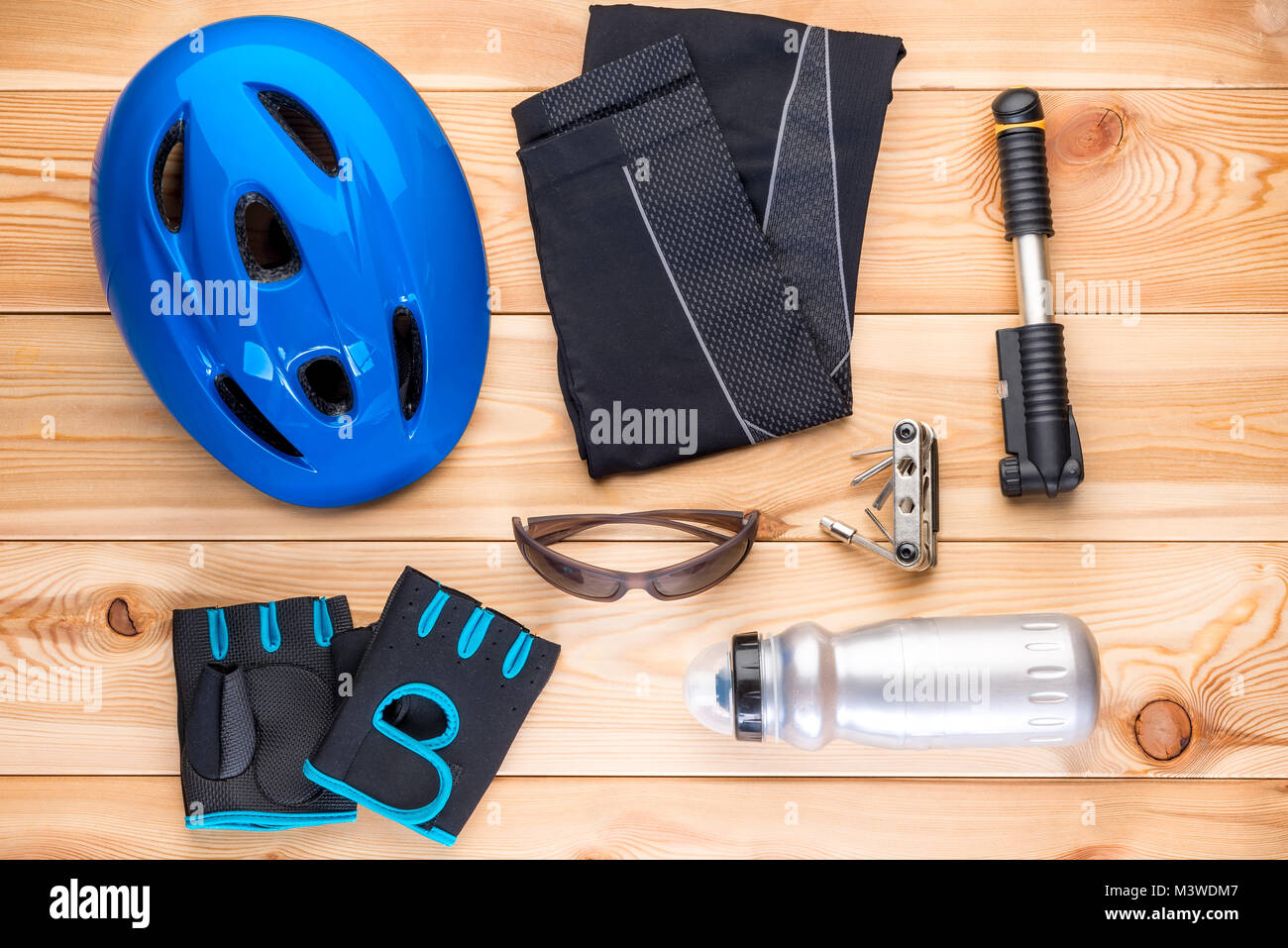 Protective Accessory Protective accessories for cycling and tools on the wooden floor Stock ...