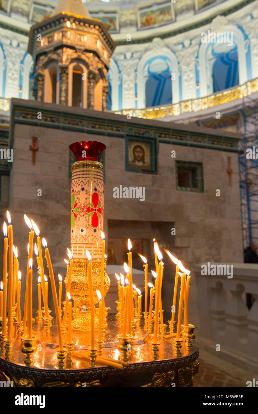 ISTRA, RUSSIA - JANUARY 3, 2017: Candles near chapel of the Holy Sepulchre in the Voskresensky New-Jerusalem Stavropegial male monastery, Istra, Mosco Stock Photo