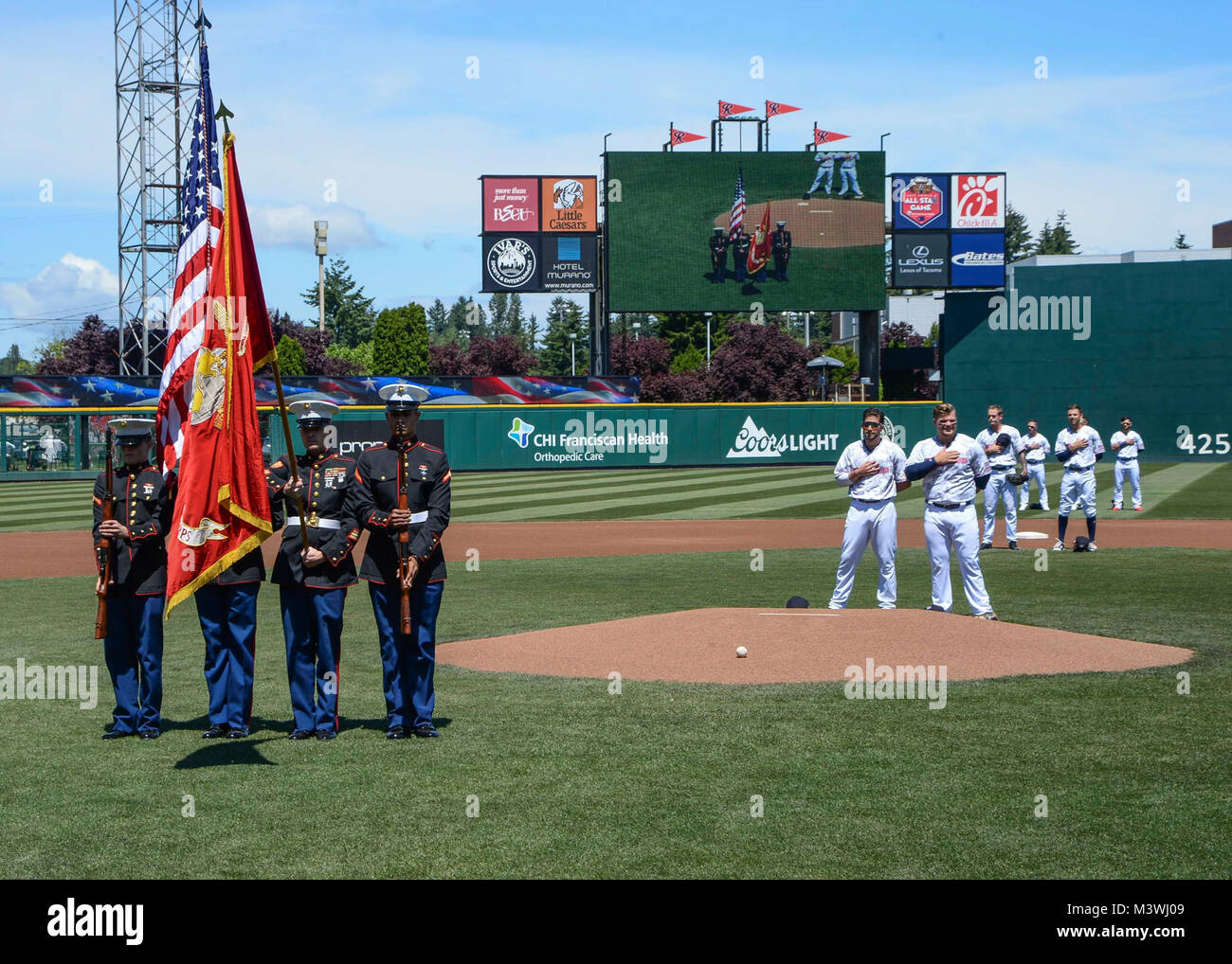 TACOMA, Wash. (June 11, 2017) The 12th Marine Corps District's Honor Guard  presents the colors during the Tacoma Rainiers Salute to Armed Forces Day  at Cheney Field. The Rainiers, the Seattle Mariners