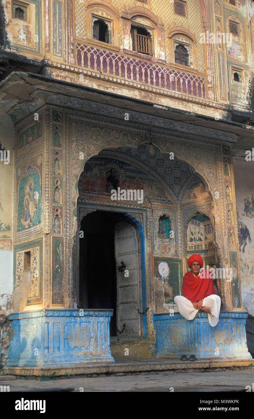 India. Rajasthan. Jaipur. Man in front of old house. Stock Photo