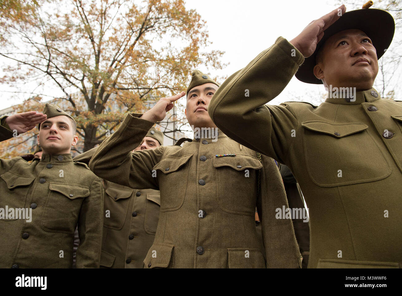 World War I re-enactors salute during the National World War I Memorial groundbreaking ceremony at Pershing Park in Washington, D.C. Nov. 9, 2017. Construction of the memorial is expected to be completed in a year. (DoD photo by EJ Hersom) 171109-D-DB155-004 by DoD News Photos Stock Photo