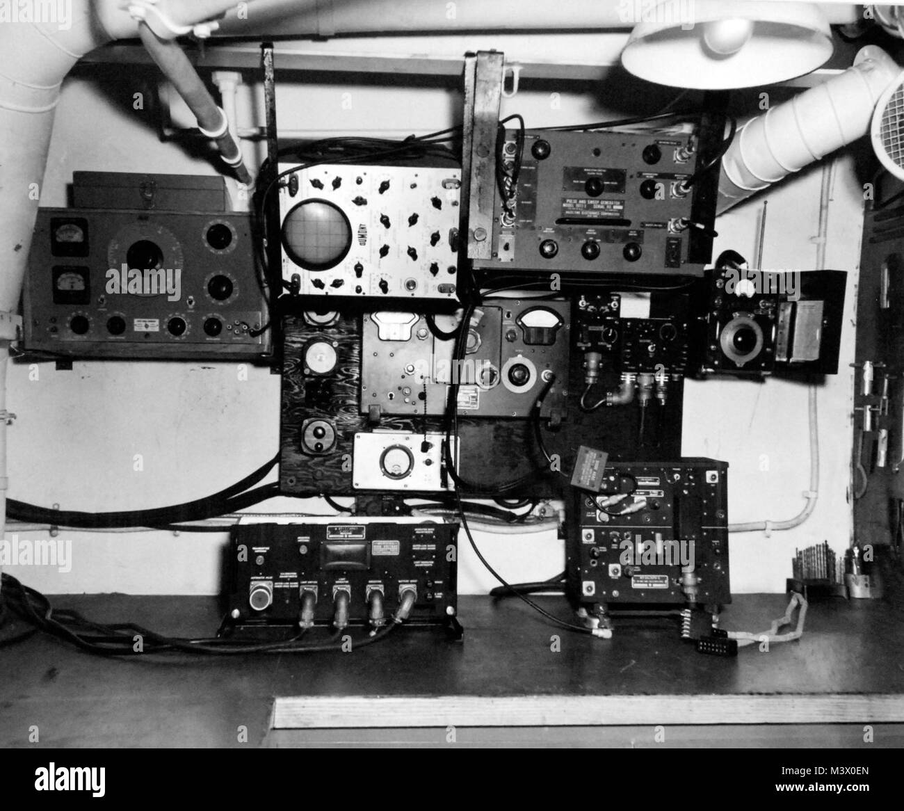 80-G-366351:  USS Card (CVE-11), May 25, 1945.  Equipment held in radar room.    Official U.S. Navy Photograph, now in the collections of the National Archives.  (2018/01/31). 80-G-366351 26136283138 o Stock Photo