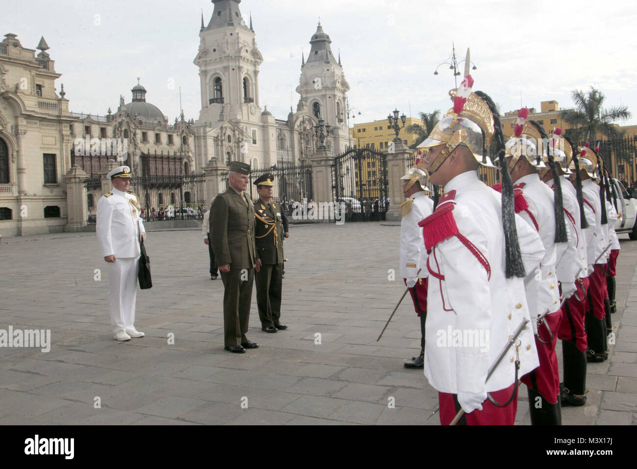 LIMA, Peru (Jan. 22, 2013) -- Marine Gen. John Kelly, commander of U.S. Southern Command, stands at attention before the Ceremonial Guard at the Presidential Palace prior to meeting with Peruvian President Ollanta Humala.  Kelly was in Peru to meet with senior defense and government officials to discuss shared security concerns and cooperation.  (Photo courtesy of Presidential Palace, Peru) 130122-A-BS728-002 by ussouthcom Stock Photo