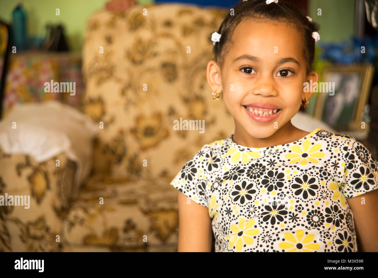 Portrait of happy Latin girl smiling Stock Photo - Alamy