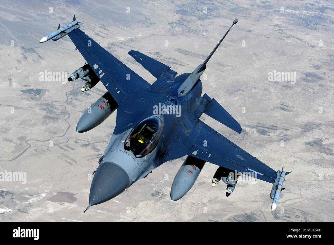 F-16 Fighting Falcon (U.S. Air Force photo/Master Sgt. William Greer) F-16 Fighting Falcon 002 by AirmanMagazine Stock Photo