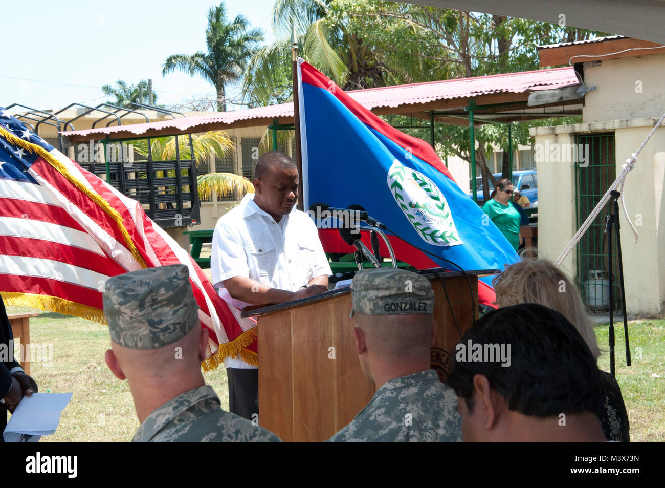 Patrick Faber, Belize minister of education, speaks during the New Horizons Belize 2014 opening ceremonies April 10, 2014, at the Edward P. Yorke school in Belize City, Belize. New Horizons is a multifaceted, international exercise comprising Belize Defence Force and U.S. military civil engineers constructing four school facilities and one medical care facility, and it also encompasses numerous medical readiness training exercises throughout the country. Opening ceremonies included presentations by each of the four schools receiving new facilities, as well as speeches from the Belizean ministe Stock Photo