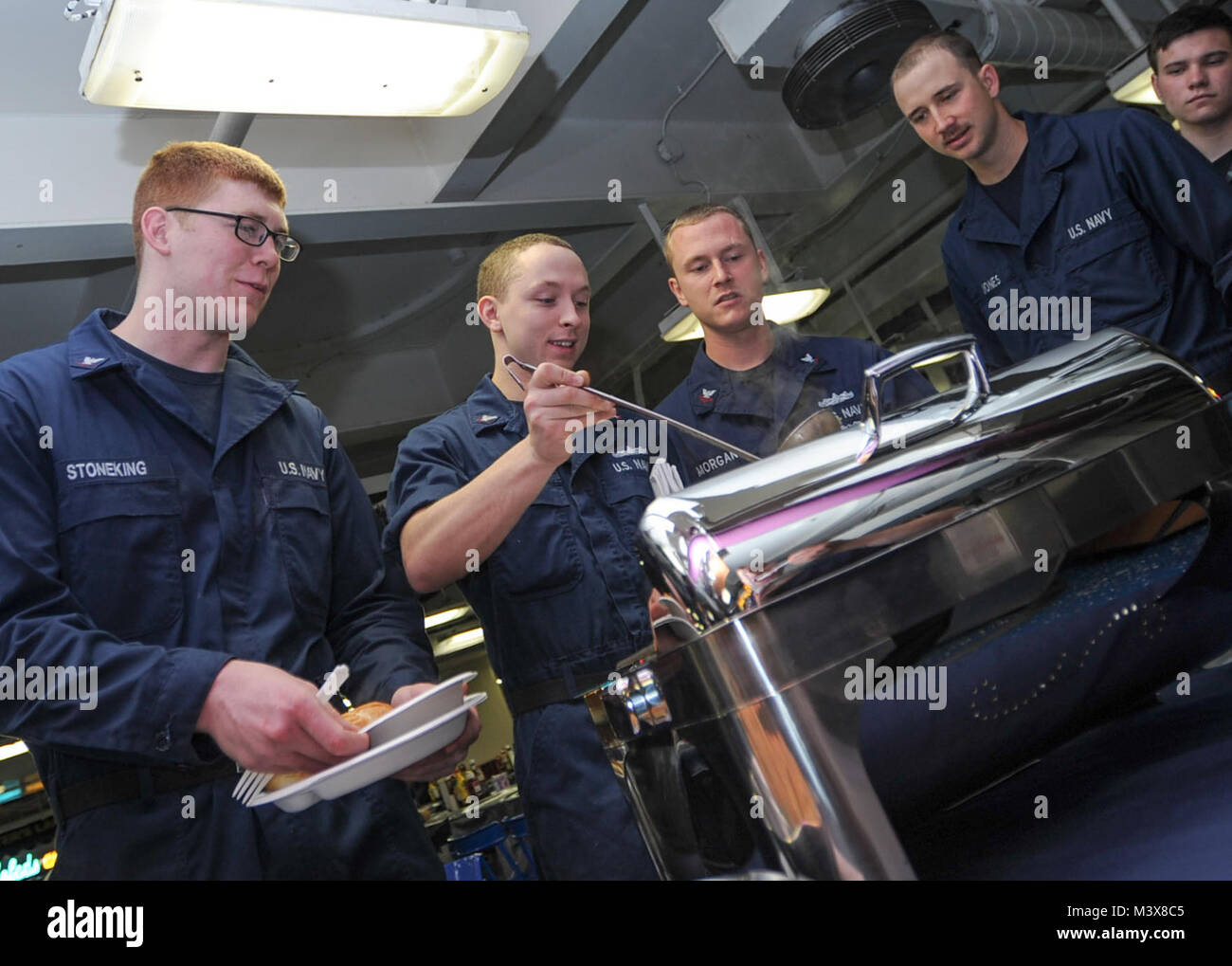 PACIFIC OCEAN (July 17, 2014) Sailors sample food items at a menu ...