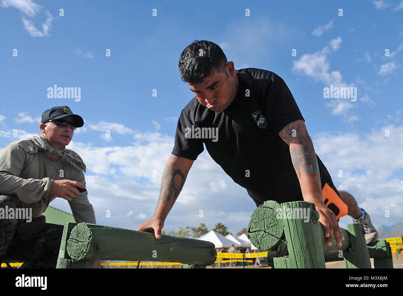 A member of the special operations team from Belize does pushups