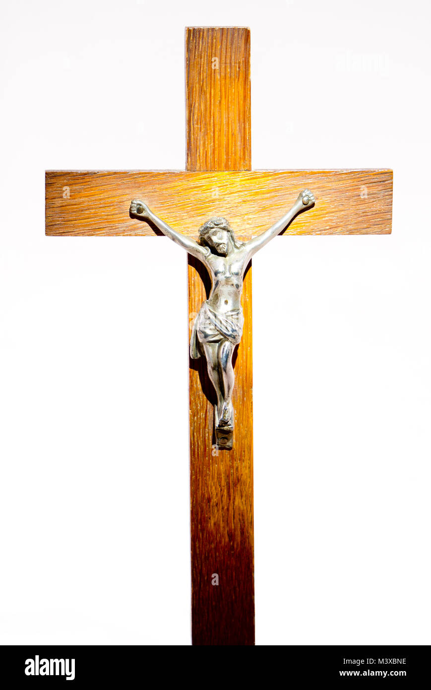 Figure of Jesus Christ on a wodden cross against a white background Stock  Photo - Alamy
