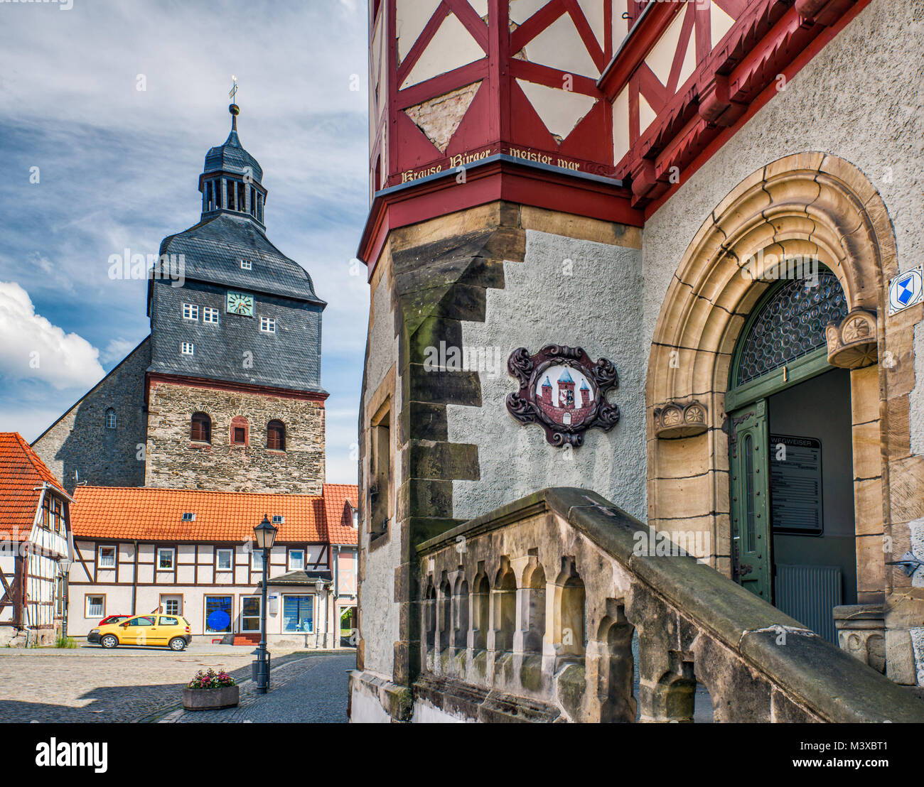 Harzgerode Half-timbered Rathaus at Markt, tower of St Marien Kirche (Church of St ...