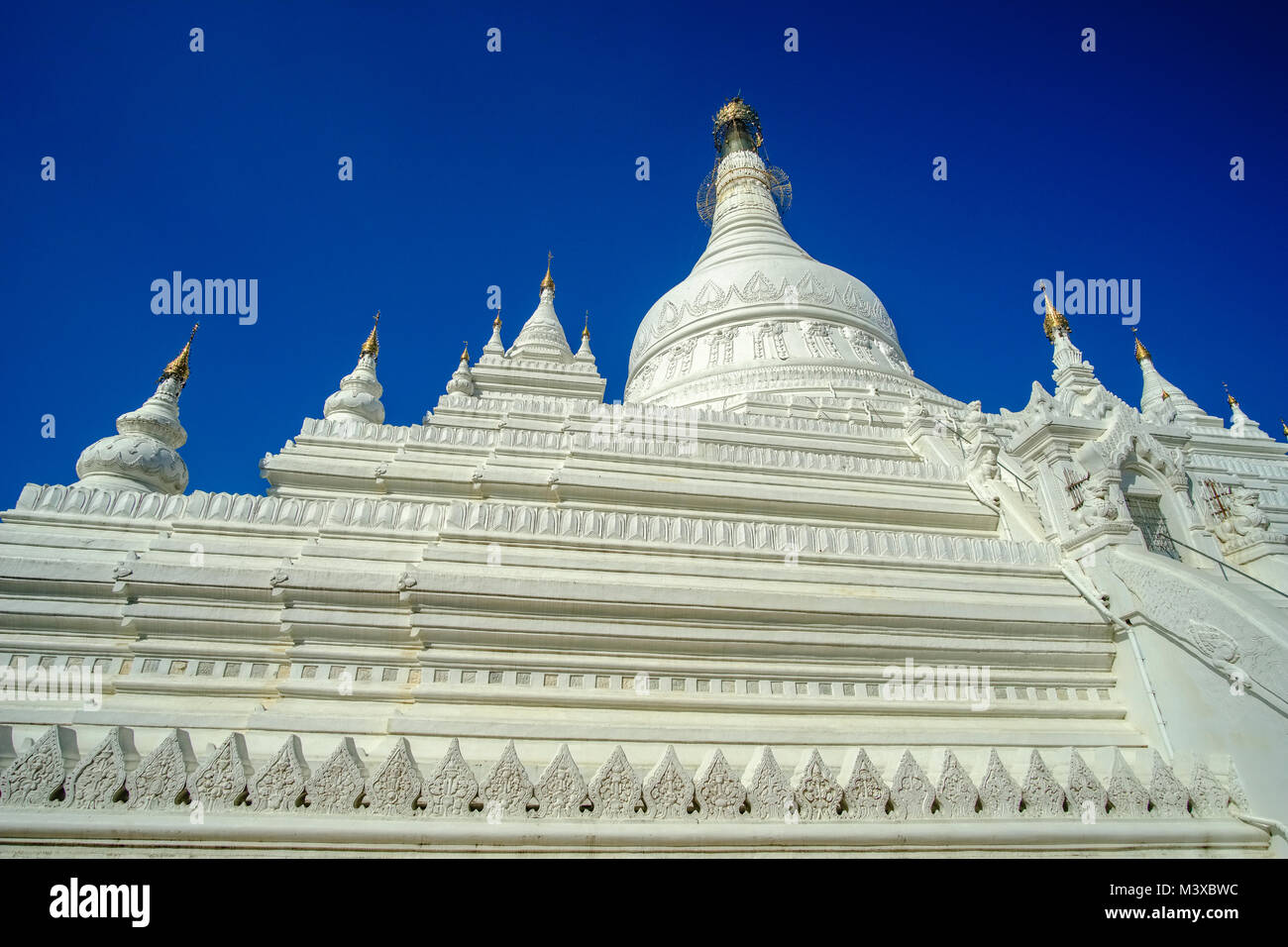 Amarapura Pahtodawgyi is a big, white Pagoda in the surroundings of U Bein Bridge Stock Photo