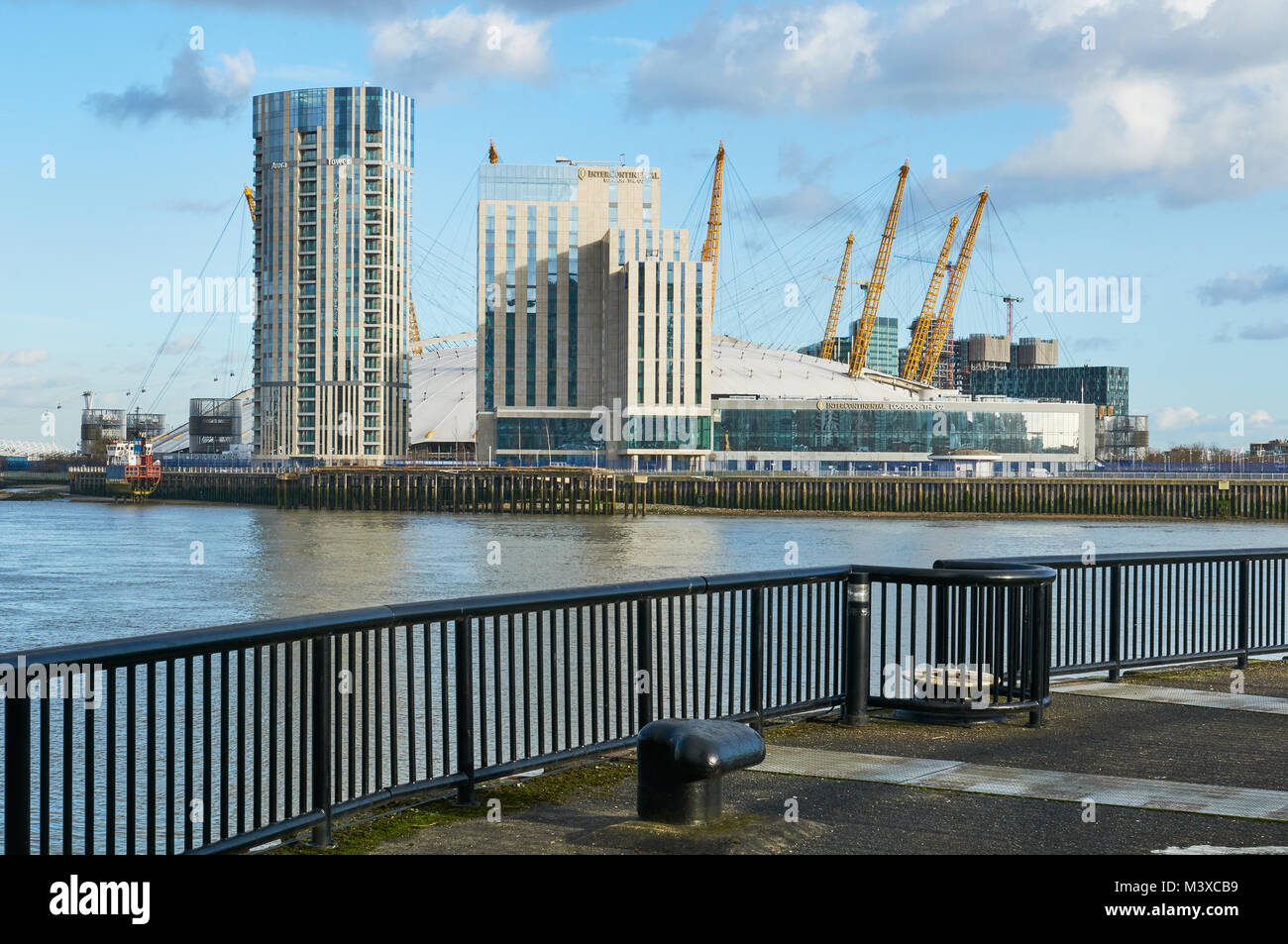 The O2 Arena and the new Intercontinental Hotel, from the North Bank of the Thames at Poplar, East London, UK Stock Photo