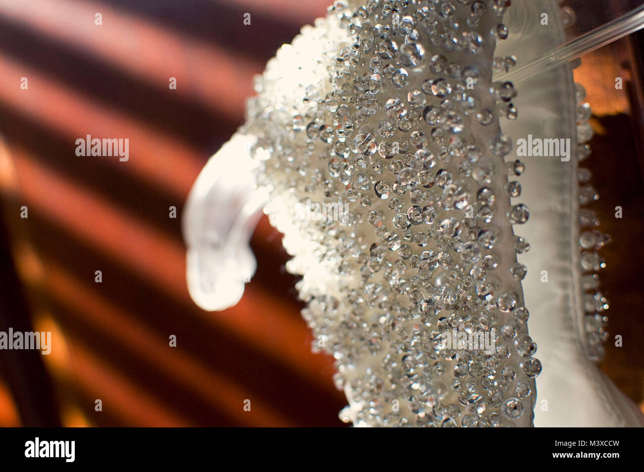 Beading Detail on a White Dress Stock Photo