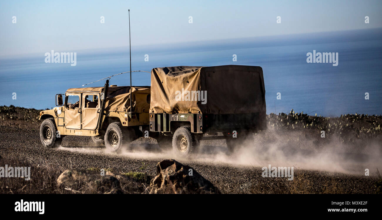 MARINE CORPS BASE CAMP PENDLETON, Calif. – U.S. Marines, with 1st Air Naval Gun Liaison Company, drive to a training location on San Clemente Island during exercise Iron Fist 2018, Jan. 31. Exercise Iron Fist brings together U.S. Marines from the 11th Marine Expeditionary Unit and Soldiers from the JGSDF, Western Army Infantry Regiment, to improve their bilateral planning, communicating, and conducting of combined amphibious operations. (U.S. Marine Corps photo by Cpl. Jacob A. Farbo) Stock Photo