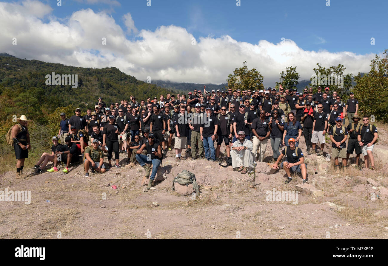 Joint Task Force-Bravo service members pose for a group photo after completing Chapel Hike 75, in Las Minitas, a village located in Ajuterique, Comayagua, Honduras, Feb. 3, 2018. Service members hiked three miles carrying bags of food on their backs to provide to the local families upon arrival to the village. (U.S. Army photo by Martin Chahin) Stock Photo